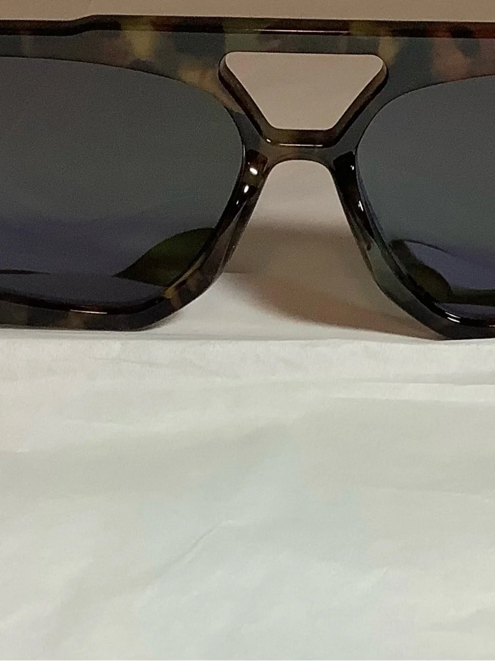 Geometric polarized square double bridge sunglasses by Sojo.